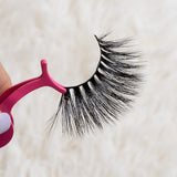 LD 5D-07 mink eyelashes held with applicator on white background.