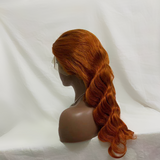 Orange ginger body wave wig on mannequin, 13x4 transparent frontal lace.