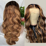 Honey blonde body wave wig with highlights and 13x4 transparent lace frontal.