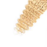 Blonde deep wave human hair closure with transparent base.