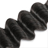 Deep wave virgin human hair natural black bundles with voluminous texture.