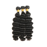 Loose deep curly virgin human hair bundles, natural black, 100 grams each, showcasing defined curls and natural luster.